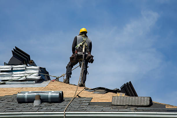 Professional Storm Damage Roof Repair technician working in Onslow, IA